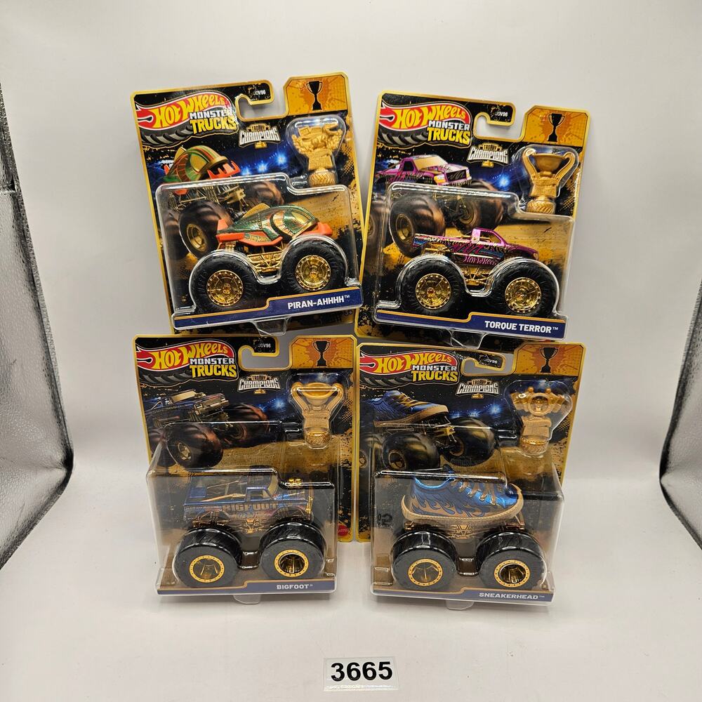 HOT WHEELS MONSTER TRUCKS TROPHY CHAMPIONS GOLD SERIES LOT OF 4 BIG FOOT SNEAKER